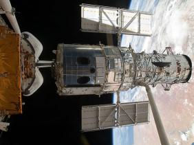 الجزائر تشارك في مشروع انشاء تليسكوب في المحطة الدولية The-Hubble-Space-Telescope-lifted-out-of-the-payload-bay-of-Atlantis-moments-before-it-is-released-into-space-following-the-successful-repair-mission-of-STS-125